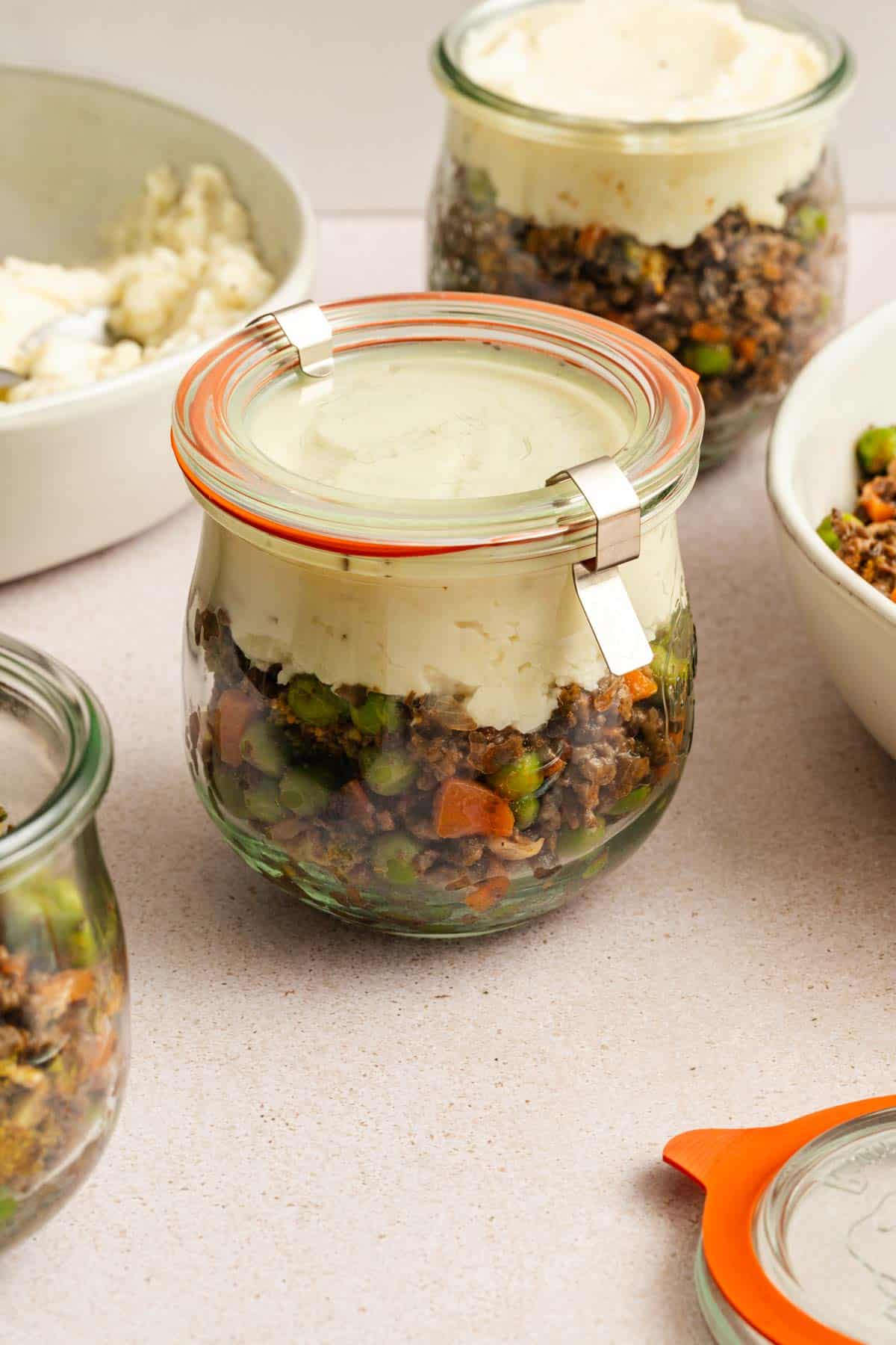 Shepherd's pie meal preps in mason jars.